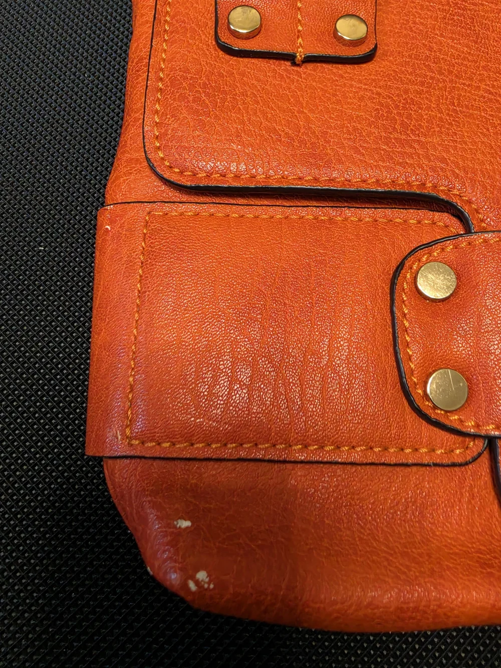 Poppie Jones Orange Leather Fold-Over Clutch with Brass Accents